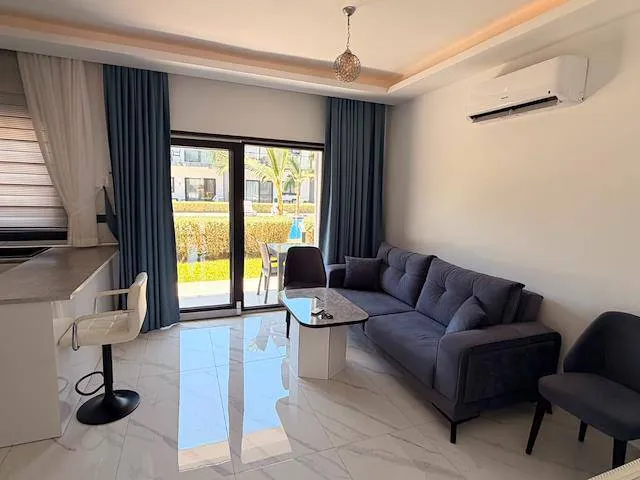Apartment zum Verkauf in Kyrenia: Bezugsfertige Wohnung mit Pool und Grünanlage