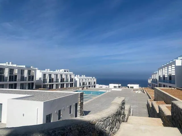 Apartment zum Verkauf in Esentepe: Meerblick im Erdgeschoss mit Sauna und Pool